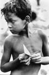 Cambodian boy with peace Crane. Photo
by Skip
Schiel