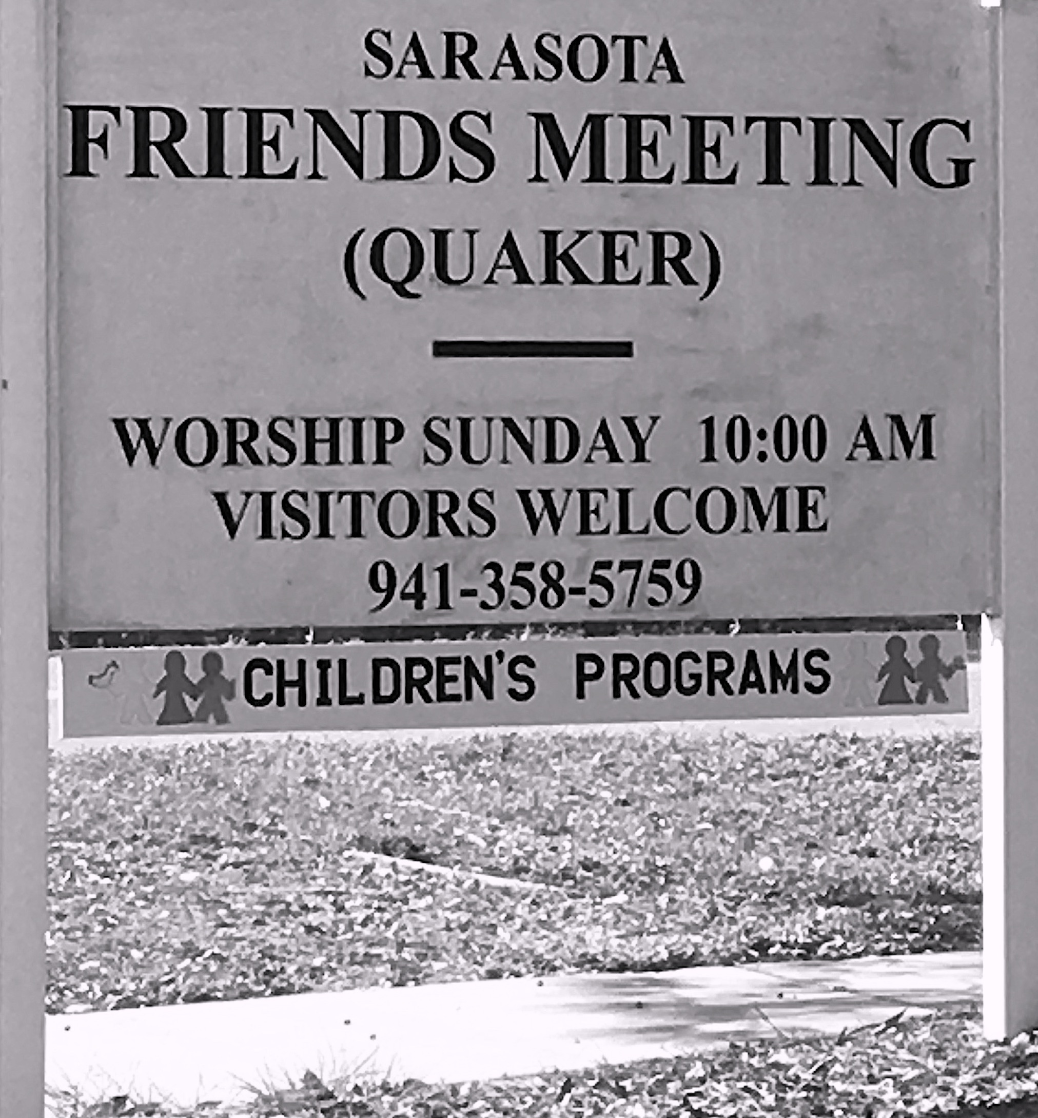 Quaker Road Sign