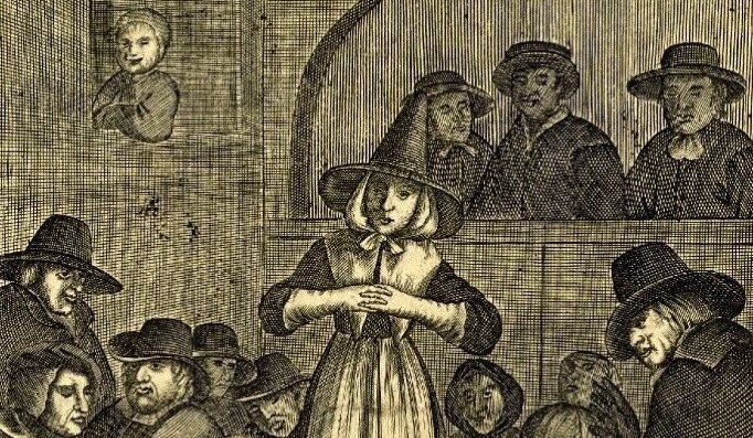 Un retrato de Lilias Skene, una Amiga escocesa del siglo XVII, predicando a un pequeño grupo reunido a su alrededor. Es una mujer con el pelo largo y rubio, vestida con un sencillo vestido y un alto sombrero puntiagudo. 
