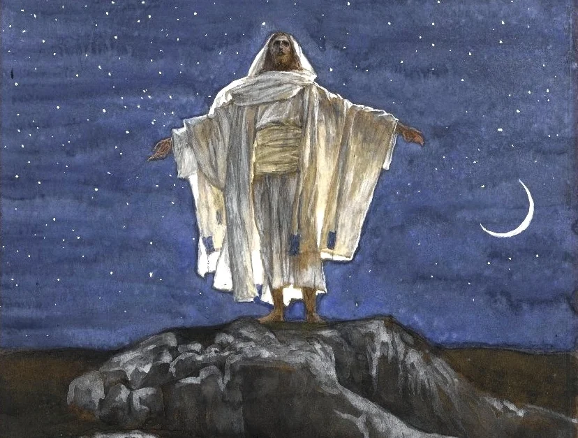 A watercolor painting of Jesus, standing on a rock at the top of a mountain, agsint the backdrop of a starry sky with a crescent moon. His arms are stretched out in prayer.