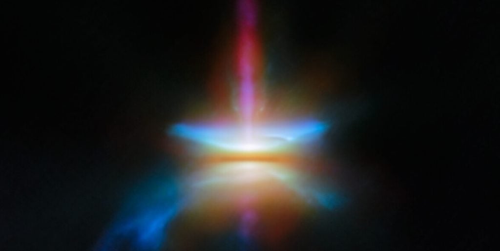 A photograph of HH30, a protoplanetary disc located in the dark cloud LDN 1551 in the Taurus Molecular Cloud, taken by the James Webb Space Telescope
