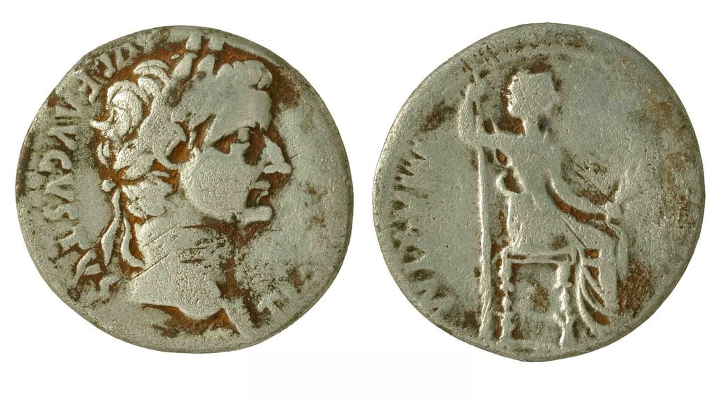Two sides of a Roman coin such as Jesus might have inspected. One side shows a bust of Tiberius Caesar, the other a woman (perhaps a goddess?) sitting on a high stool.